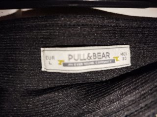 Falda  Pull and Bear tubo negra estampado floral