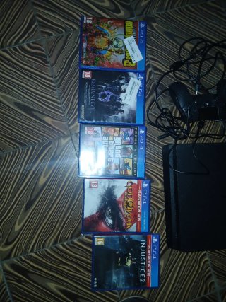 PS4 Negra + 5 Juegos + Mando