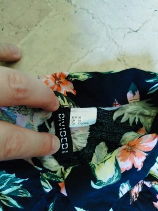 Camicia nera floreale uomo