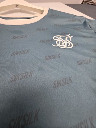 2 Camisetas SikSilk Talla M Rosas