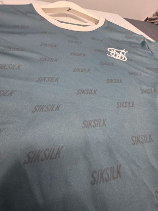 2 Camisetas SikSilk Talla M Rosas