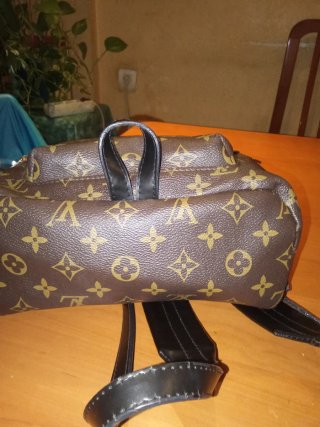 Mochila Louis Vuitton Marrón y Dorada