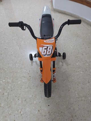 Moto electrica infantil con ruedines