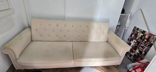 Sofá cama Capitoné en color Beige