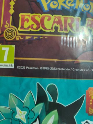 Revista Pokémon con sobre de cartas