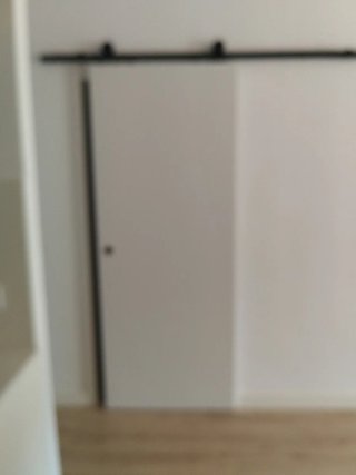 Puerta corredera madera maciza