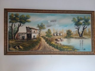 Cuadro paisaje rural con casa y río