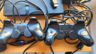 PlayStation 2 Slim + 2 mandos originales