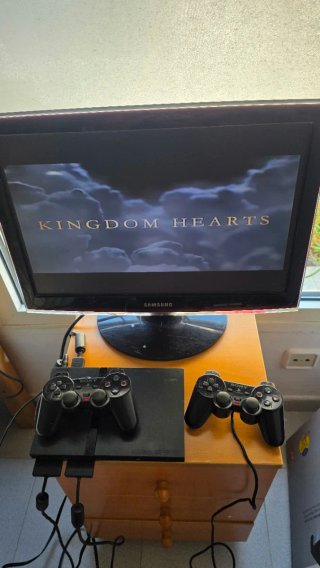 PlayStation 2 Slim + 2 mandos originales