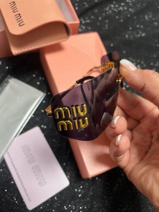 Occhiali da sole Miu Miu oro e viola