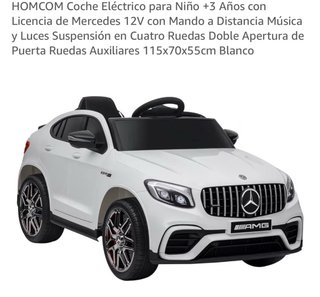 Coche eléctrico infantil blanco.