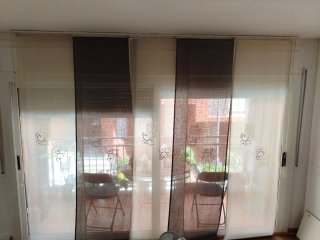 Cortinas de comedor beige y marrón