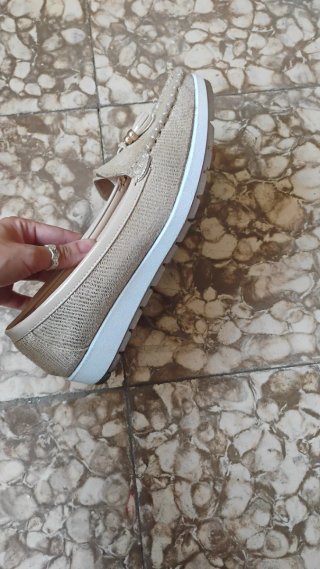 Mocasines dorados con flecos