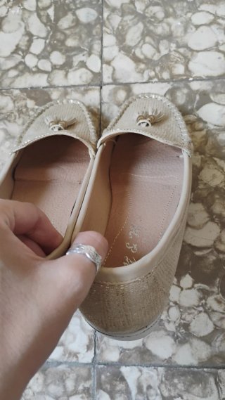 Mocasines dorados con flecos