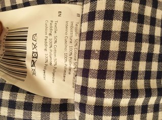 Cama para perros azul y negra con lazo