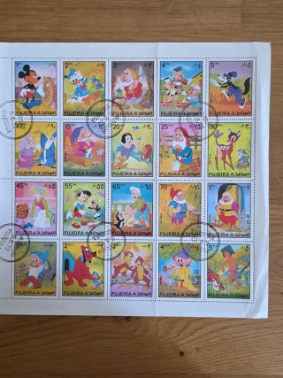 Bloque 20 sellos Disney matasellos Fujeira 1972