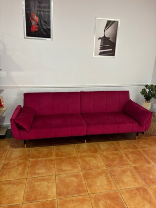 Sofá rosa en perfecto estado