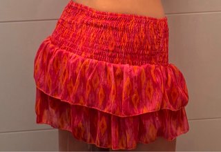 Falda pantalón corta con volantes y estampado