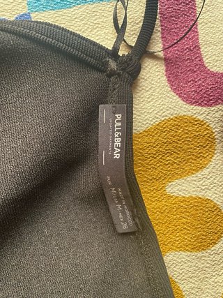 Top negro de Pull and Bear de espalda descubierta