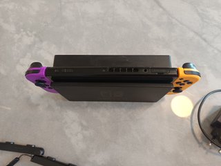 Nintendo Switch Morado y Naranja + Accesorios