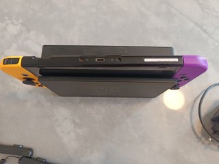 Nintendo Switch Morado y Naranja + Accesorios