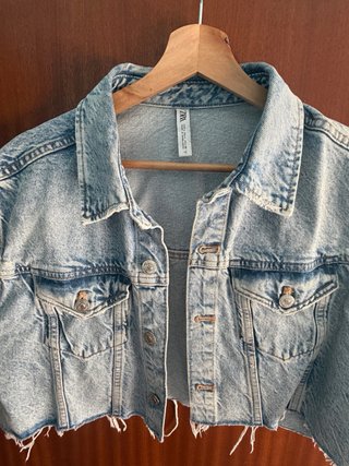 Chaleco vaquero desgastado