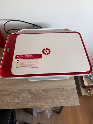 Impresora HP Roja y Blanca