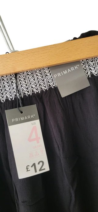 Pantalones anchos negros bordados