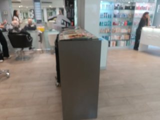 Mueble expositor para recepción peluqueria