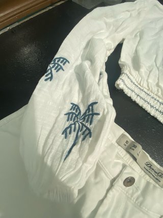 Conjunto blanco de pantalon y top