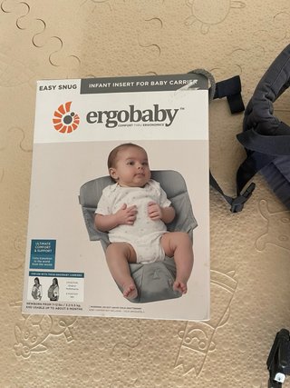 Mochila Ergobaby con adaptador