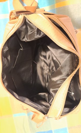 Bolso convertible a mochila beige
