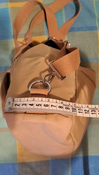 Bolso convertible a mochila beige