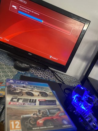 Ps4 mas mando y 1 juego de coches, tv oki y cables