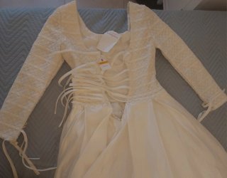 Vestido de novia vintage con cola larga