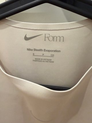 Body Nike sin mangas color beige