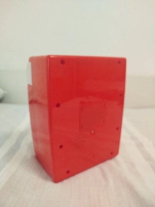 Lavadora de juguete roja