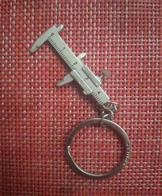 Llavero metálico calibre
