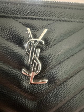 Pochette o portafoglio in pelle di vitello ysl