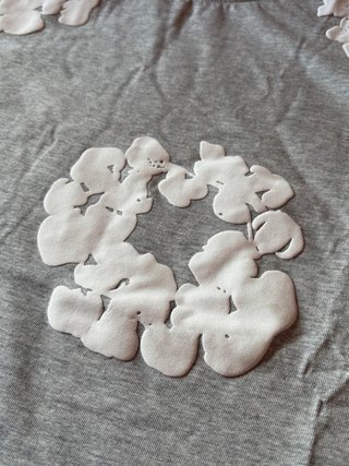 maglia grigia denim tears