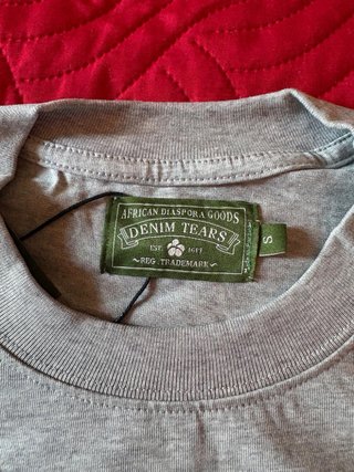 maglia grigia denim tears