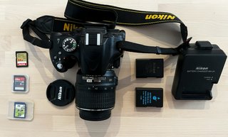 Nikon D5100 + objetivo 18-55 VR + accesorios