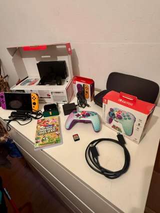 Nintendo Switch Rosa/Morado + Accesorios