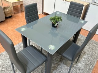 MESA CRISTAL CON 4 SILLAS POLIPIEL