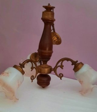 Lampadario vintage in legno e ottone