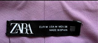 Pantalon de vestir de  Zara talla M color malva.