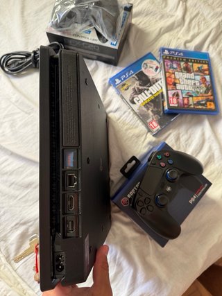 PlayStation 4 como nuevo incluye 2 mando y 2 juego