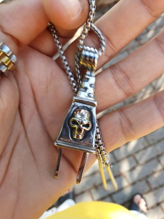 Lotto uomo: collana con pendente teschio + anello