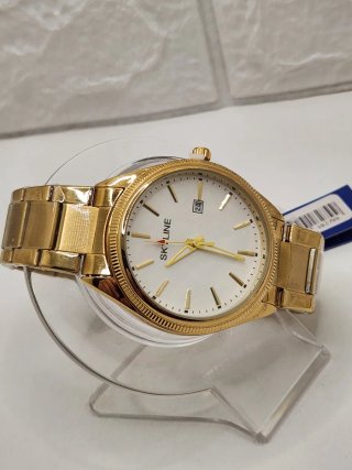 Reloj skyline acero quirúrgico chapado en oro