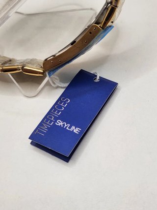 Reloj skyline acero quirúrgico chapado en oro